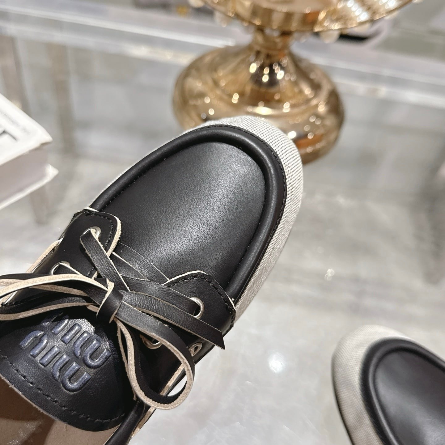 M1um1u Canvas And Bleached Leather Boat Shoes Black