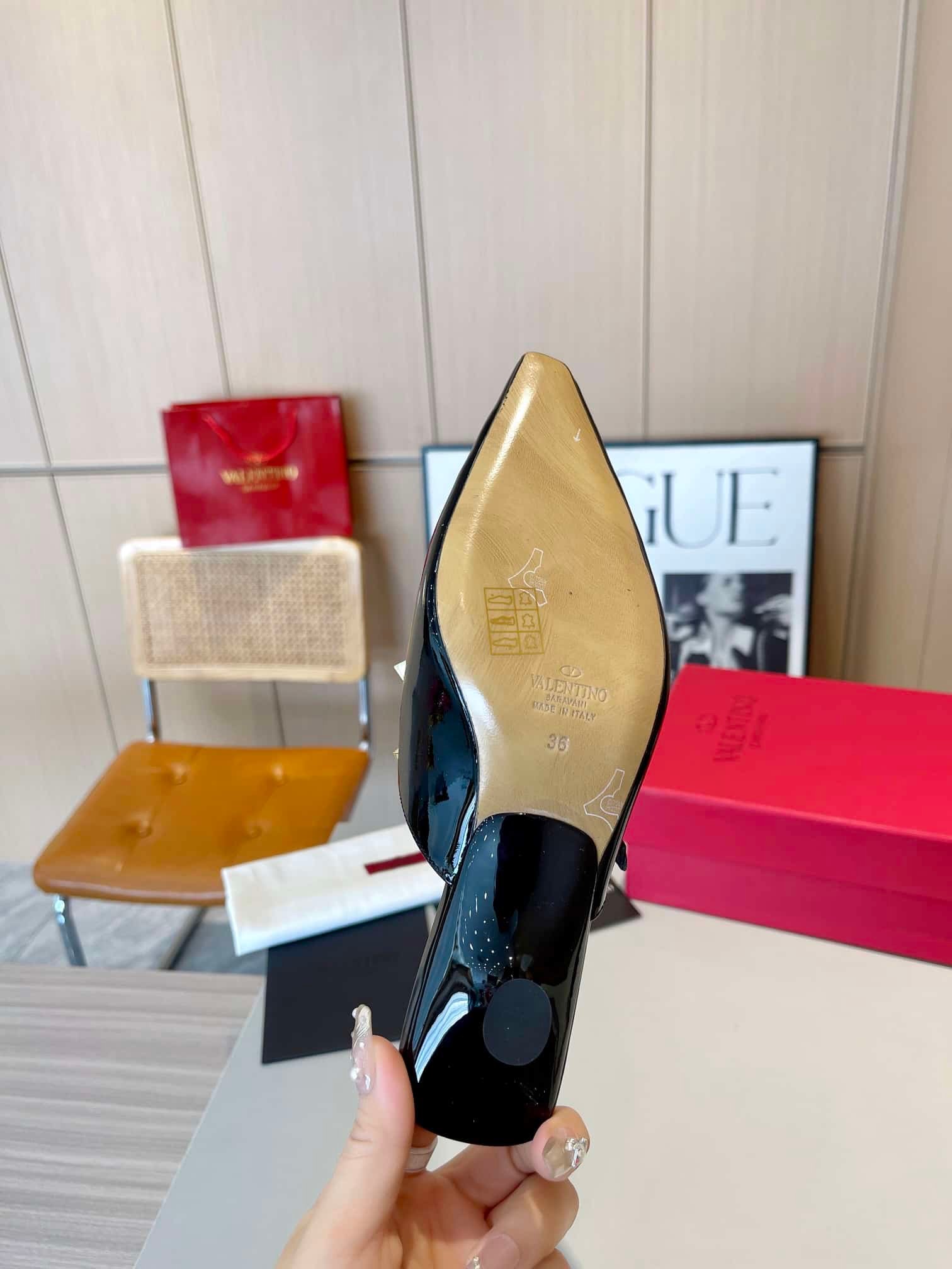Va1e*ntin0 Garavani Rockstud Asymmetric Patent Leather Mules Black